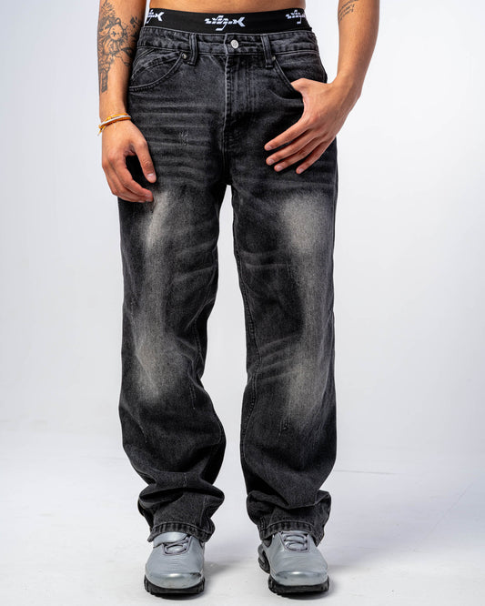 JEANS FLARE FIT CON ZIP