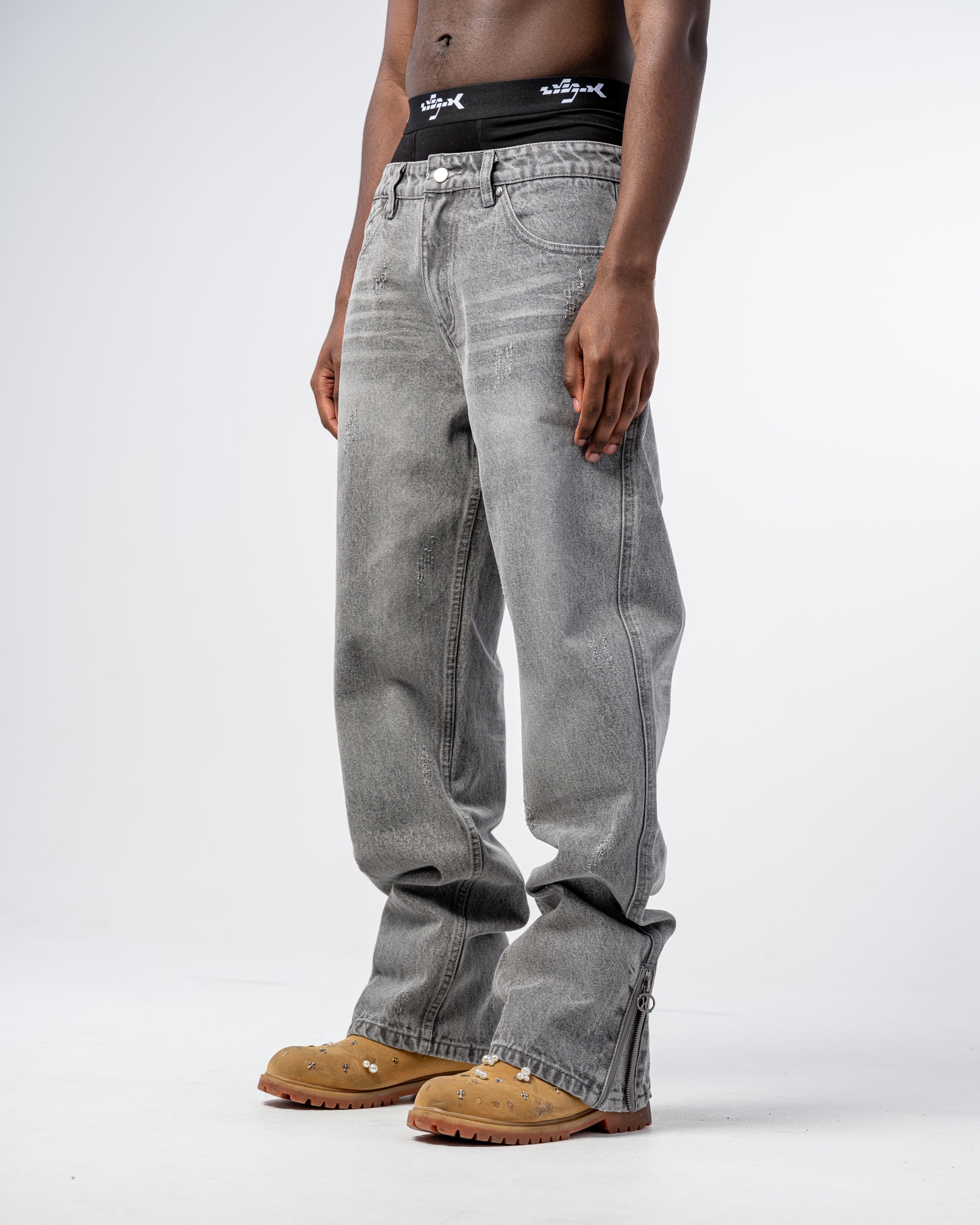 JEANS FLARE FIT CON CREMALLERA [GRIS]